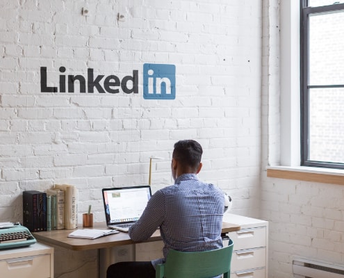 Man sitting at a desk in the LinkedIn Office