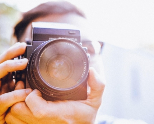 Close up of photographer
