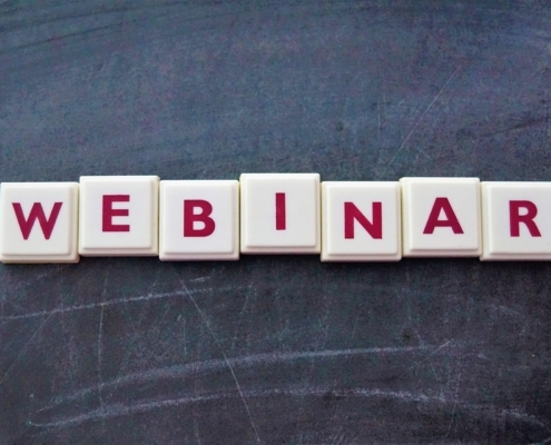 Webinar spelled out in Scrabble pieces