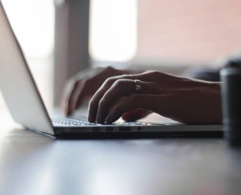 Typing on a laptop keyboard