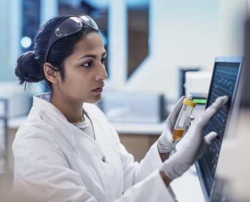 Female Scientist Working in The Lab, Using Computer Screen